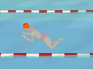 Observe how the swimmer inhales while the hands pull down and out from the water's surface