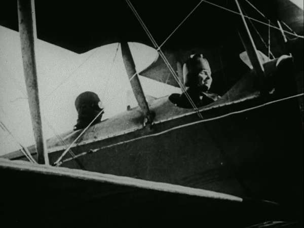 Still from the film Deliverance, 1919. The story of Helen Keller and Anne Sullivan. View shows Keller in the cockpit/front seat of an airplane.