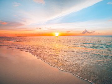 Sunset over the Indian ocean in the Maldives. Sunrise
